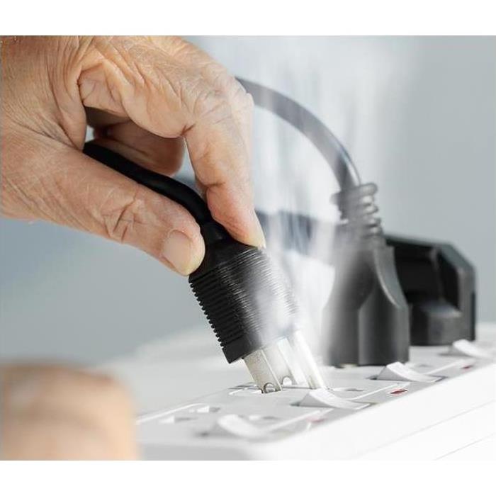 Do not use outlet extension cords to plug in home appliances
